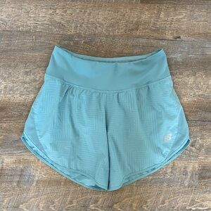 New balance blue lined shorts size small